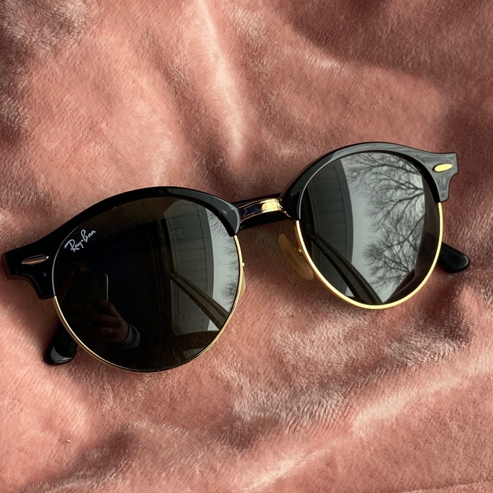 Black & gold ray bans